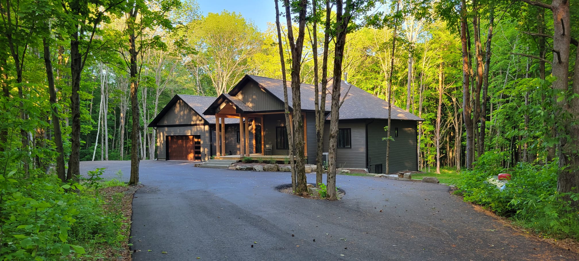 Elements Cottages — long driveway approach